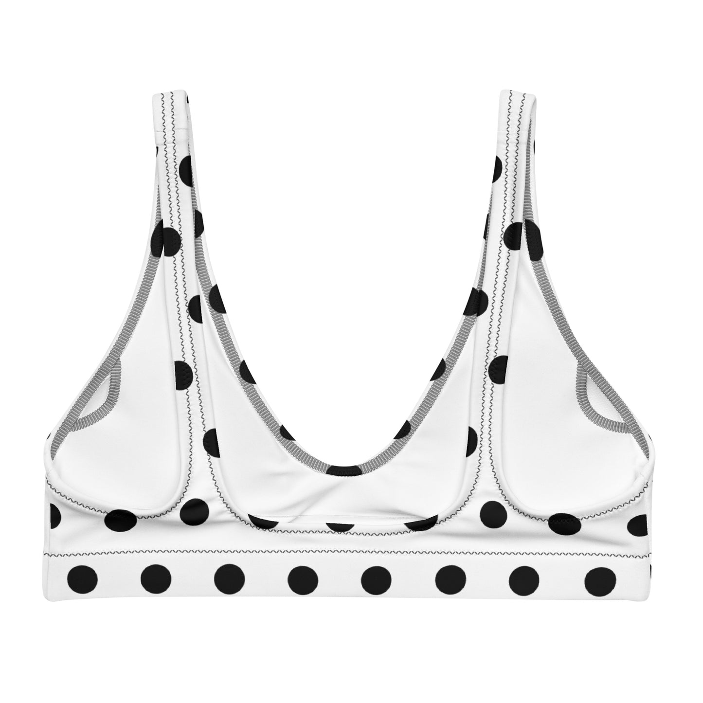 The classic black hue serves as a versatile backdrop, while the playful polka dot pattern adds a touch of whimsy and charm.