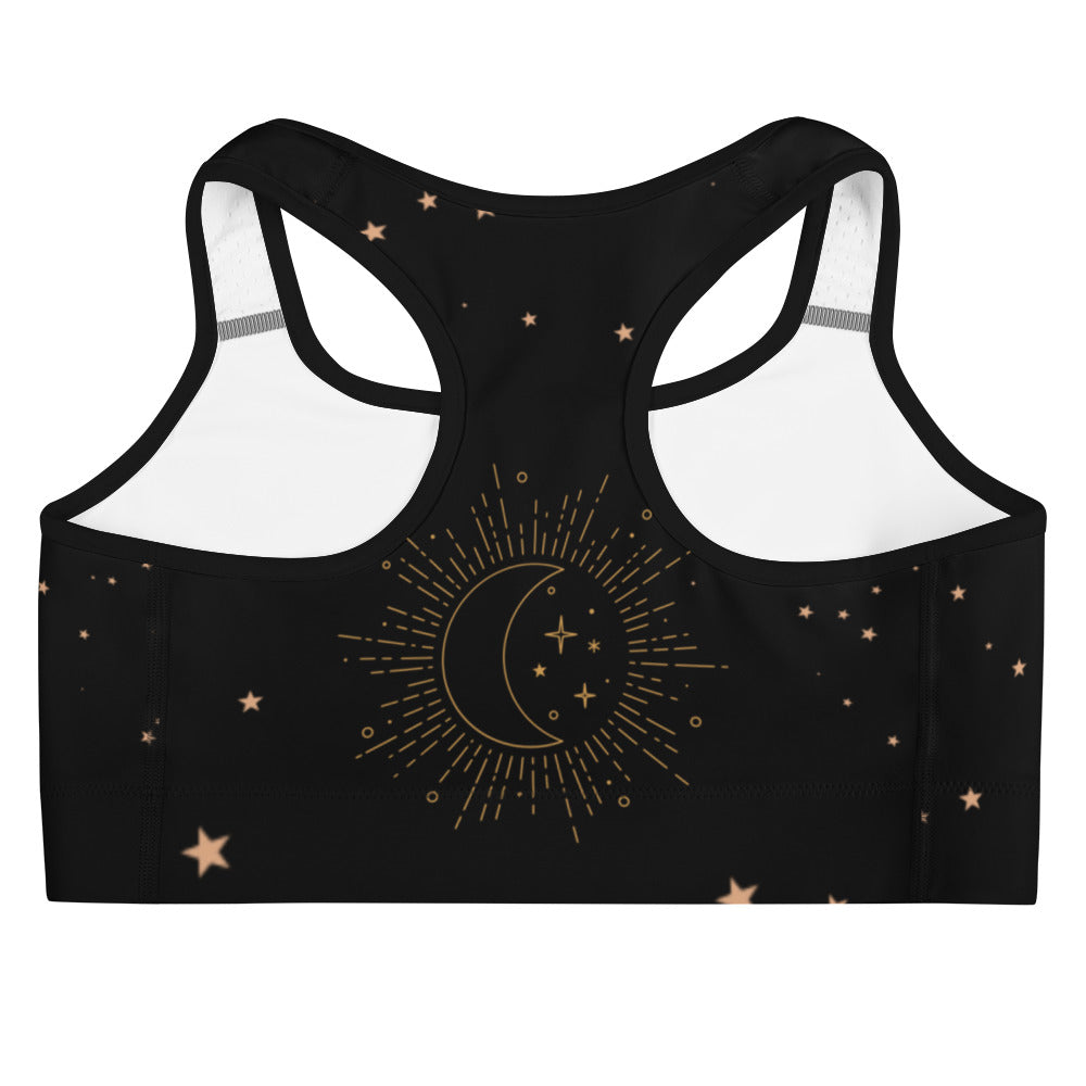 Designed with a chic black hue and adorned with intricate zodiac-inspired patterns, this sports bra seamlessly blends style with functionality.