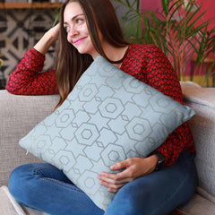 Eye-catching blue cushion cover with geometric print for