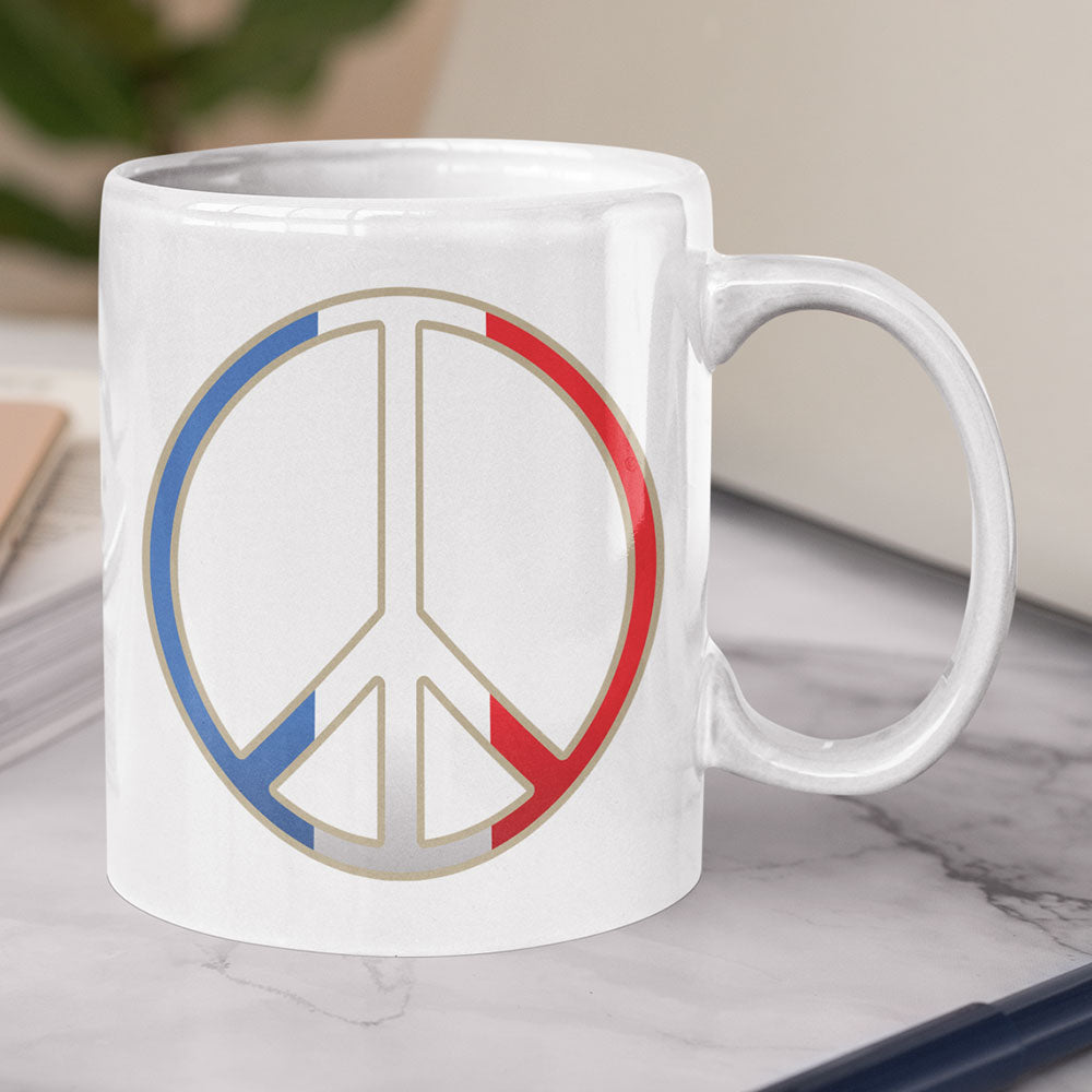 Artistic peace symbol graphic on a ceramic mug