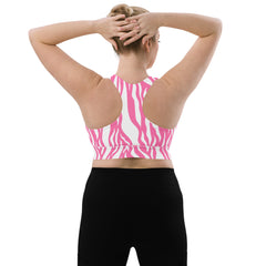 Whether you're hitting the gym or practicing yoga, this sports bra offers both fashion-forward flair and performance.