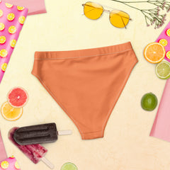 Whether you're lounging under a palm tree or taking a dip in the crystal-clear water, our Orange Bikini Bottom guarantees a memorable and fashionable swimwear experience.