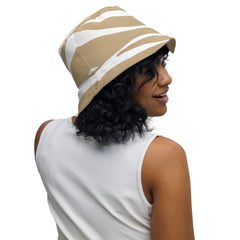 "Glamorous Wilderness: Gold and White Animal Print Bucket Hat, lioness-love