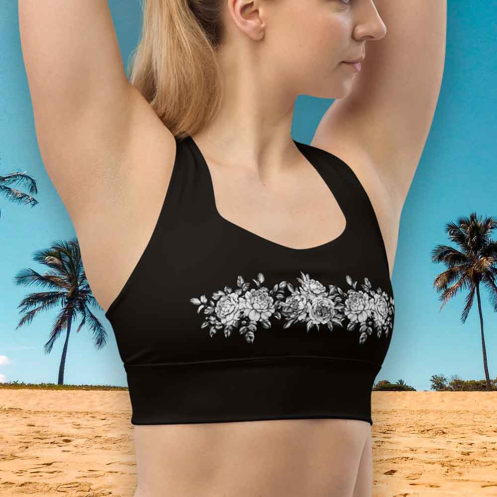 Floral print black longline sports bra - woman wearing stylish activewear bra during workout lioness-love