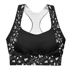 Introducing our White Floral on Black Long Line Sports Bra, a blend of elegance and performance for your active endeavors. 