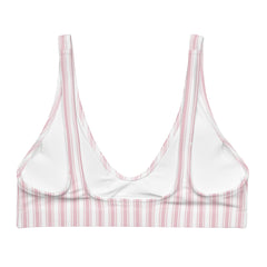 Crafted from high-quality, durable materials, this bikini top features vertical stripes that elongate the torso and create a flattering silhouette. 