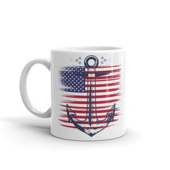 This high-quality ceramic mug showcases a vibrant and detailed design, featuring the iconic American flag elegantly draped over an anchor. 