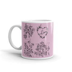 This charming ceramic mug is adorned with a beautiful design that exudes love and positivity. 